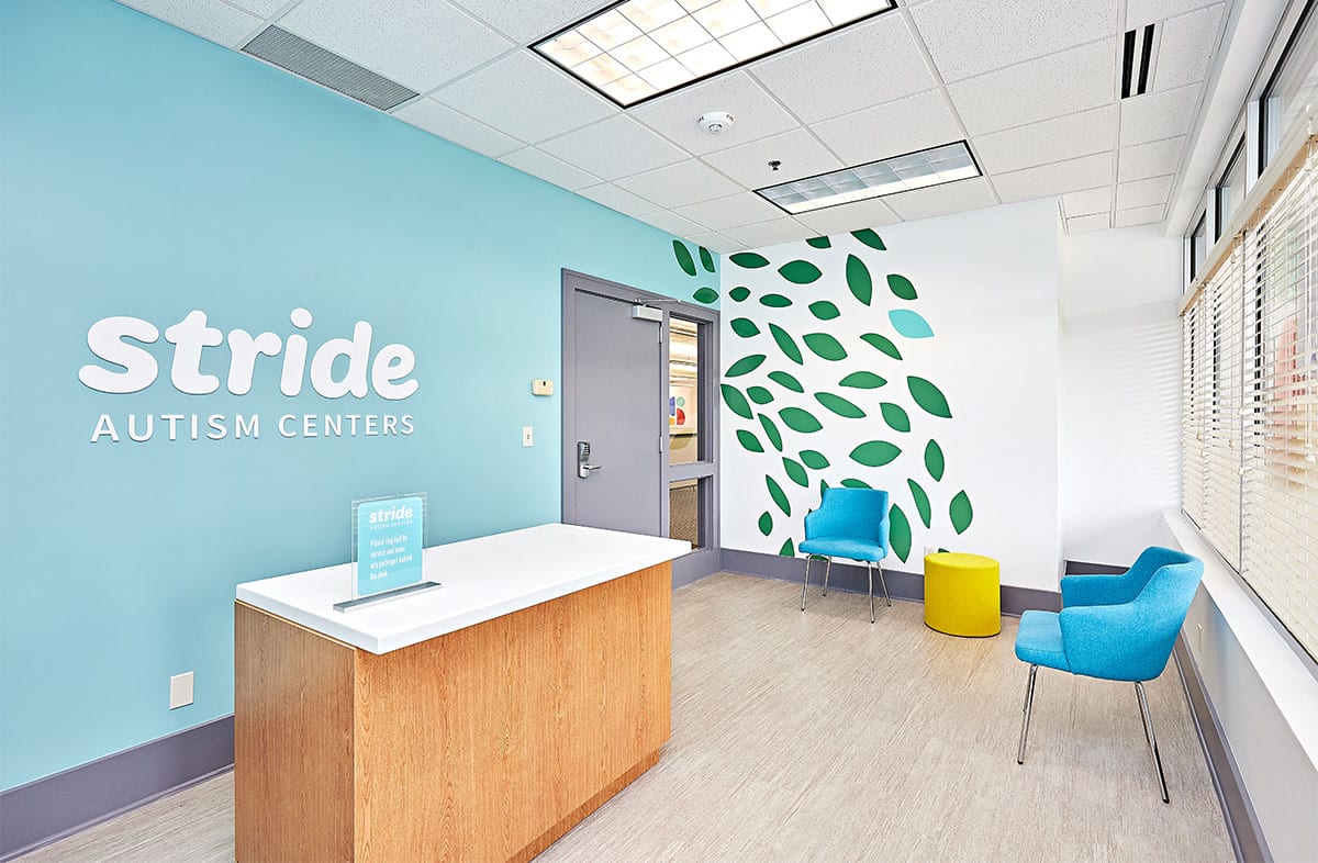 Interior view of the front reception area of the Stride Autism Center for children near Carlisle, Iowa.