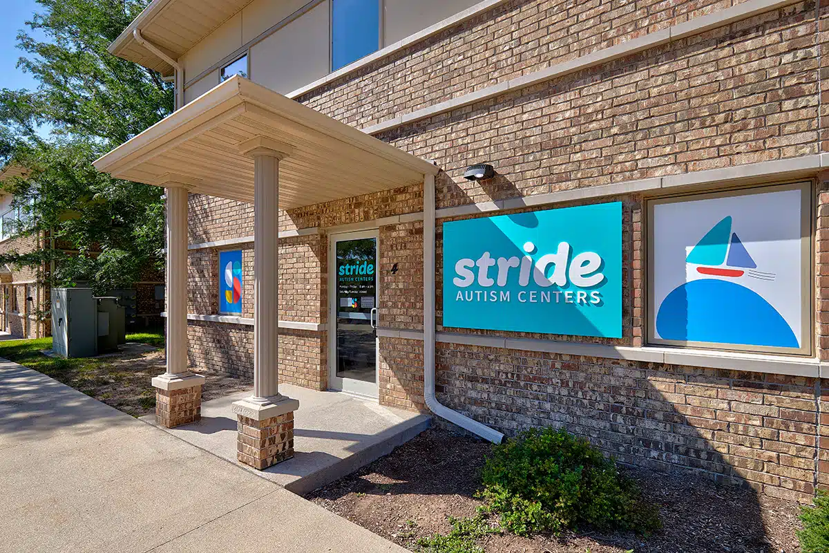 Photo of a building with a signage that reads "Stride Autism Centers."