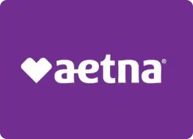Photo of a heart-shaped logo and text that reads "aetna."