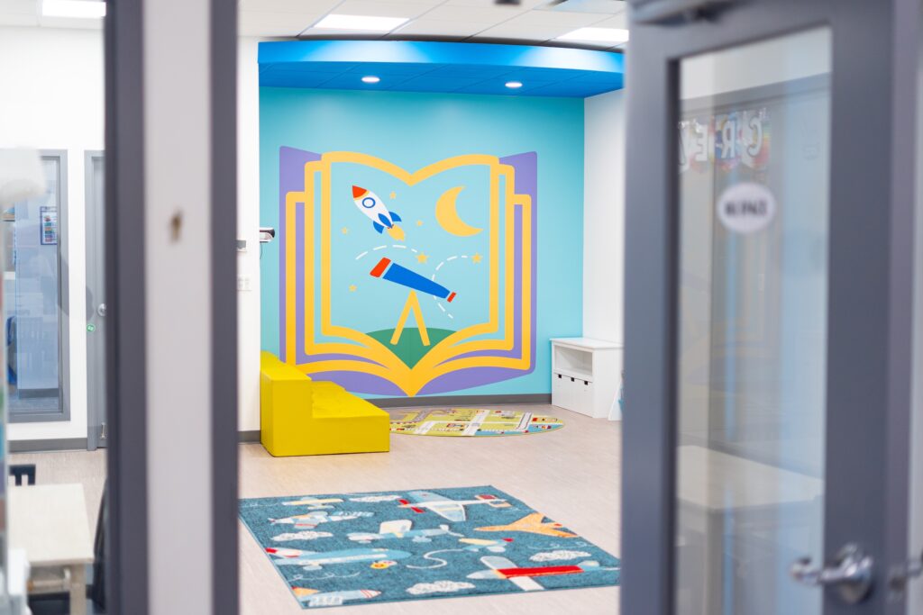 A modern and colorful lobby area at the Stride Autism Centers&reg; Oak Park, IL clinic provides a welcoming environment.